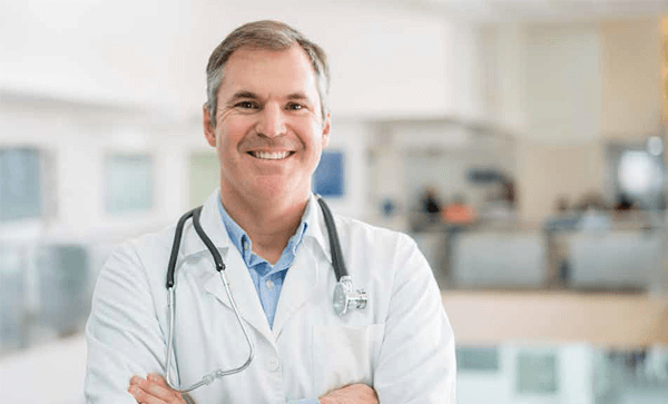 Doctor With Stethoscope- Compliance Lessons For Retiring Physicians Sponsored By: How To Avoid Risk When Closing A Practice | Iron Mountain