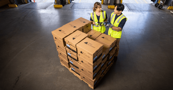 Employees managing boxes