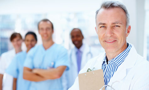  Improving Patient Matching in Healthcare Organizations - A doctor smiling