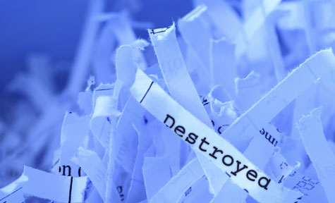  Retention and Destruction Schedules: Why You Need Both - Shredded paper
