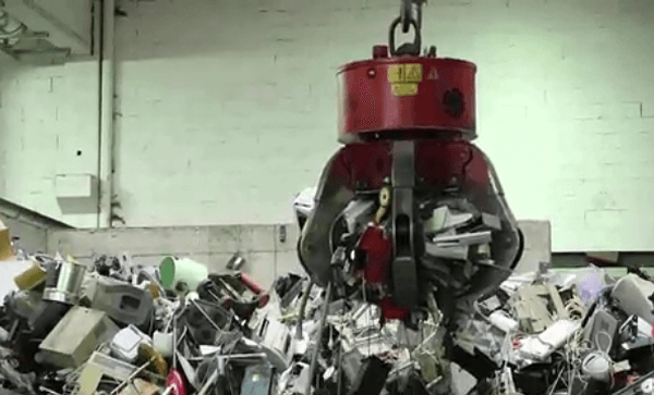 Behind the Scenes of an ITAD Specialist-Machine Picking Waste
