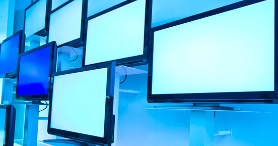 3 ways nontechnical media and entertainment people can benefit from content services- Monitors placed on a wall